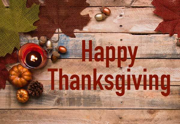 Thanksgiving words on a wooden plank